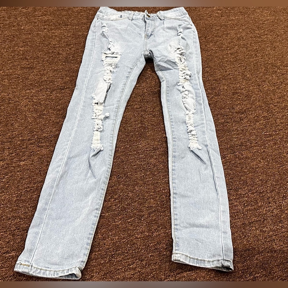 Junior ladies  High Rise Blue Jeans Size M Distressed Light Wash